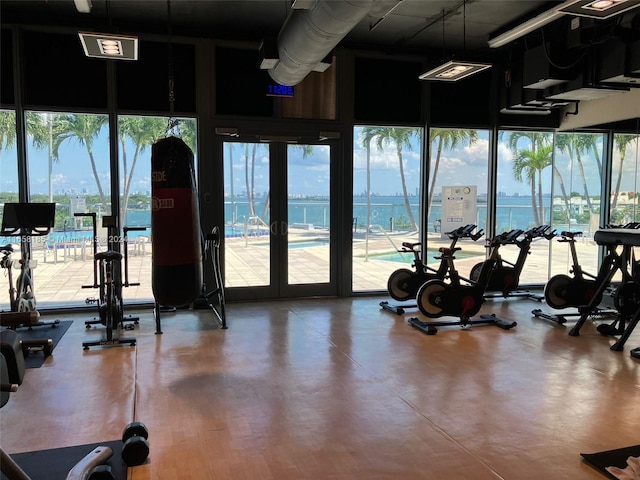 gym with a water view