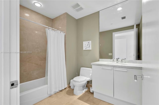 full bathroom featuring vanity, toilet, tile patterned floors, and shower / bathtub combination with curtain