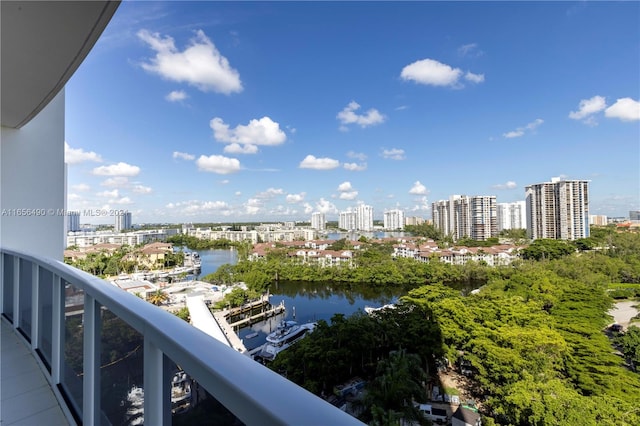 balcony featuring a water view