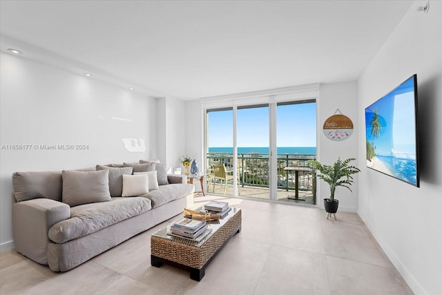 living room featuring a water view