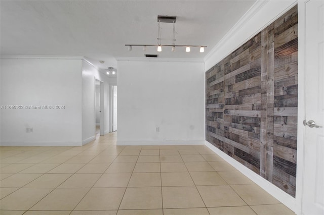 tiled empty room with ornamental molding