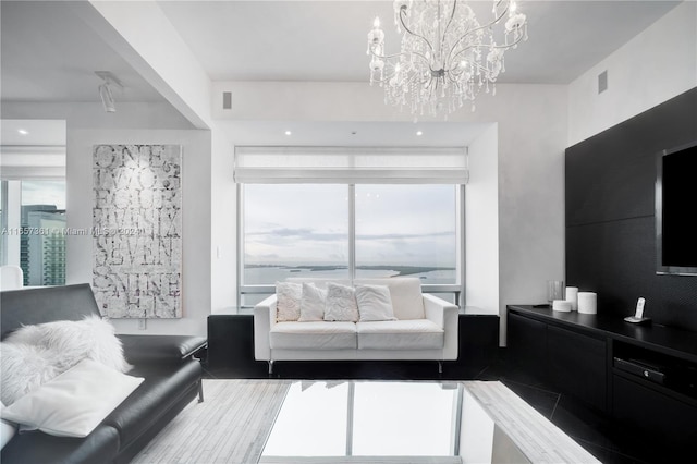 living room featuring an inviting chandelier