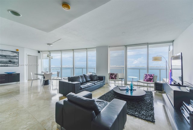 living room with a wall of windows and a textured ceiling