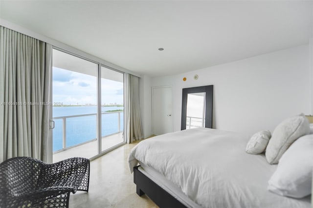 665 NE 25th St Unit 1704, Miami, FL 33137 - bedroom featuring a water view, access to outside, and a wall of windows