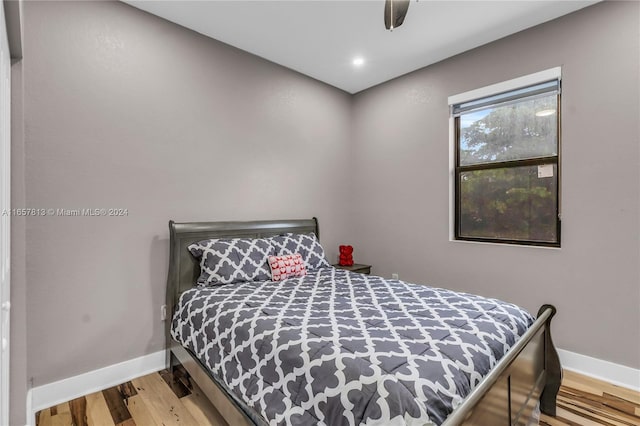 bedroom featuring ceiling fan and wood-type flooring