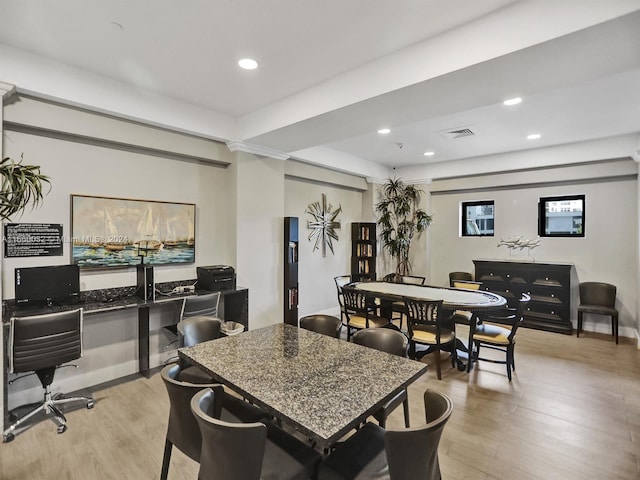 dining space with light wood-type flooring