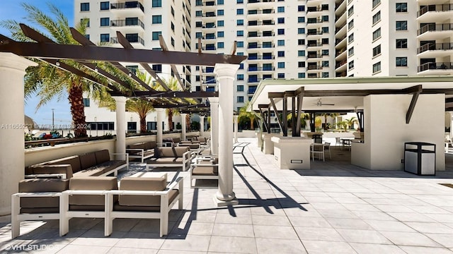 view of patio with a pergola and an outdoor living space