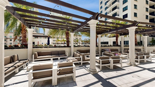 view of patio / terrace featuring outdoor lounge area and a pergola