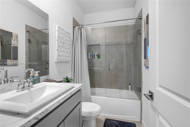 full bathroom with shower / bath combo, toilet, and vanity