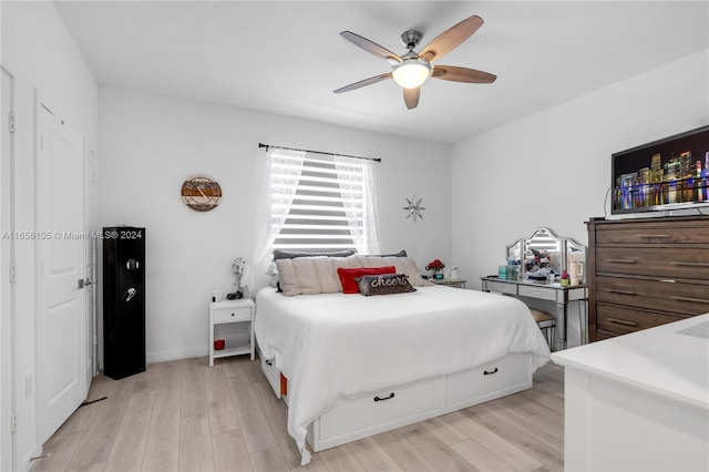 bedroom featuring ceiling fan and light hardwood / wood-style flooring