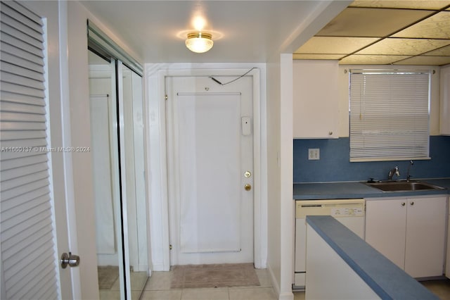 interior space with sink and tile patterned flooring