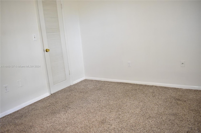 unfurnished bedroom with carpet flooring