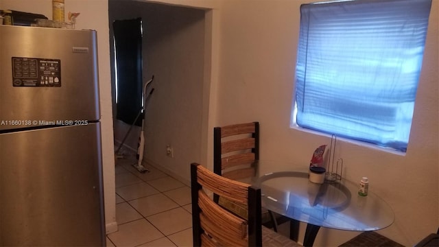 dining room featuring light tile patterned floors