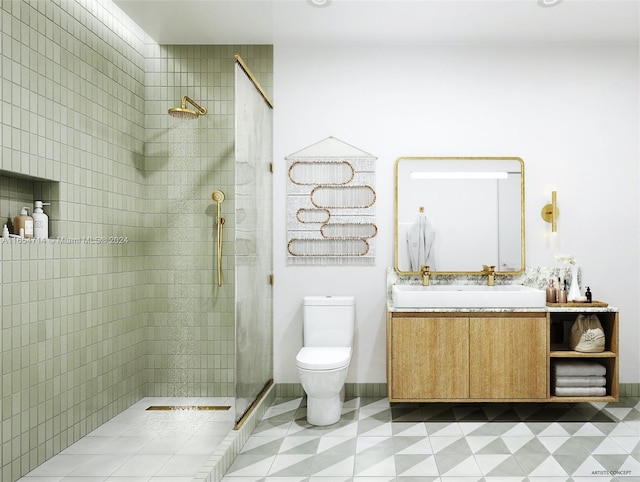 bathroom with toilet, a shower with door, and vanity