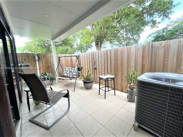 view of patio / terrace with cooling unit