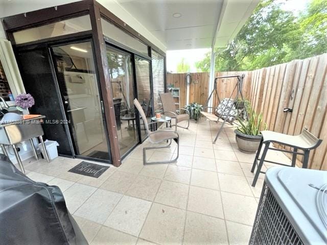 view of patio / terrace featuring cooling unit