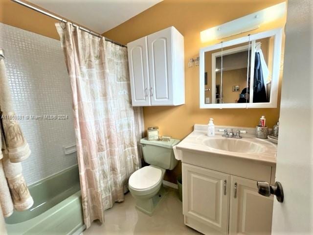 full bathroom featuring vanity, toilet, and shower / bathtub combination with curtain