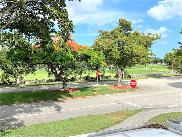 view of community featuring a yard