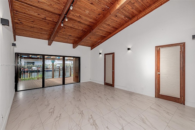 unfurnished room featuring track lighting, high vaulted ceiling, beamed ceiling, and wooden ceiling