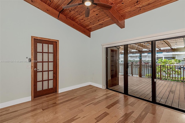 spare room with wood ceiling, light hardwood / wood-style flooring, french doors, ceiling fan, and lofted ceiling with beams