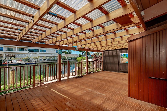 wooden terrace with a water view