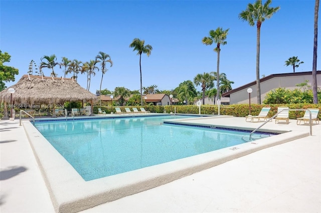 view of swimming pool featuring a patio area