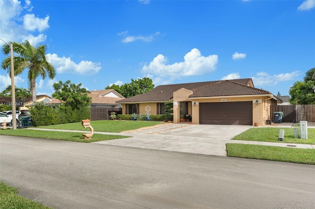 single story home with a garage and a front lawn