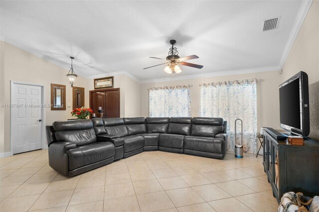 living room featuring crown molding, light tile patterned floors, and ceiling fan