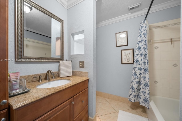 bathroom featuring tile patterned flooring, crown molding, vanity, a textured ceiling, and shower / bath combination with curtain