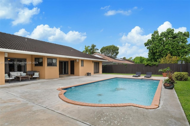 view of pool with a patio area