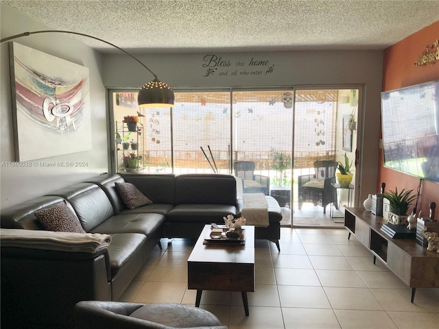 tiled living room with a textured ceiling