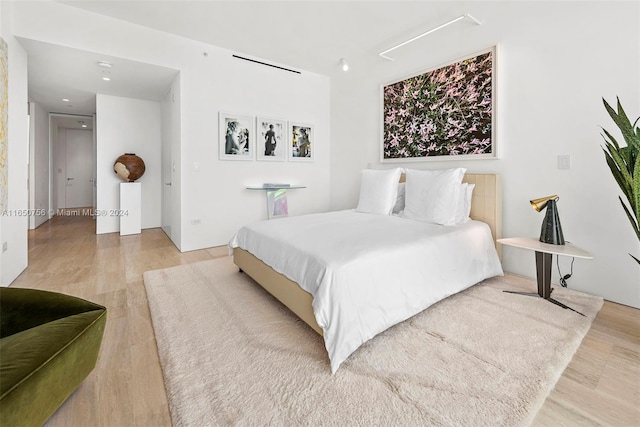 bedroom featuring light hardwood / wood-style flooring