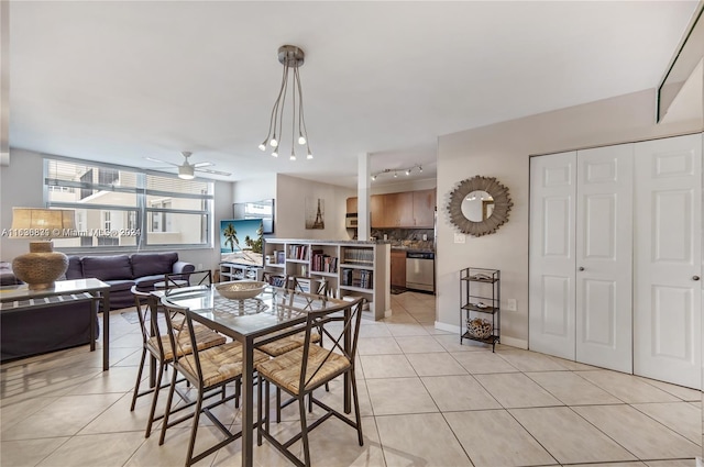 tiled dining room with ceiling fan