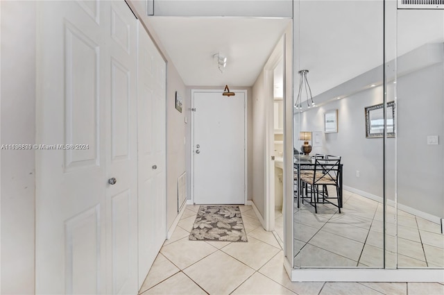 interior space with light tile patterned floors