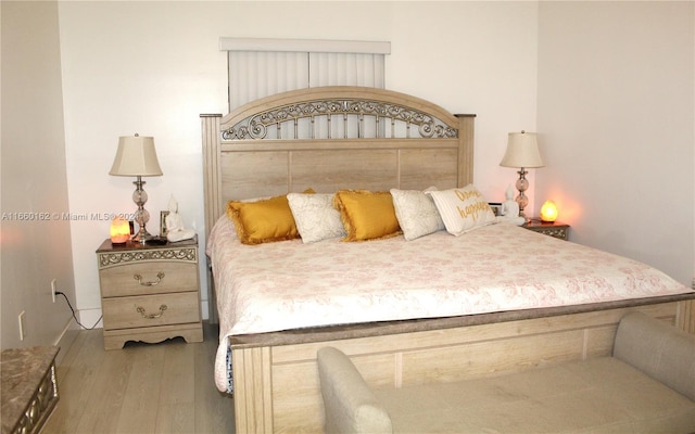 bedroom featuring hardwood / wood-style flooring