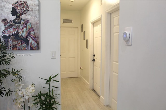 hall featuring light hardwood / wood-style flooring