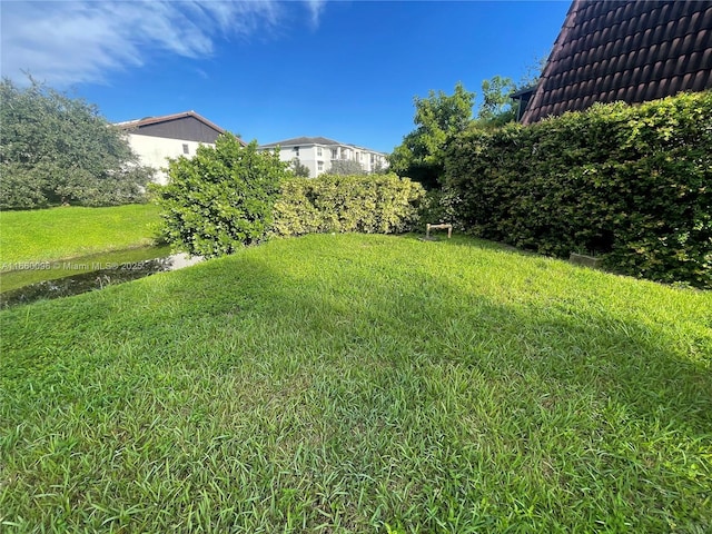 view of yard with a pergola