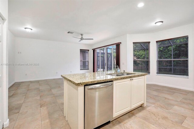 15421 SW 18th St, Miramar, FL 33027 - kitchen with dishwasher, ceiling fan, an island with sink, light stone counters, and open floor plan
