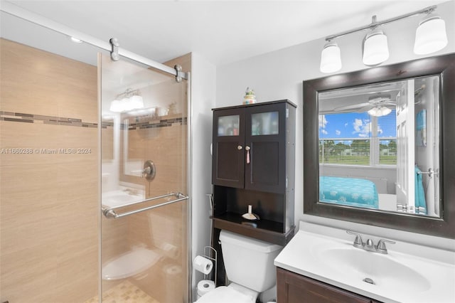 bathroom with vanity, toilet, and walk in shower