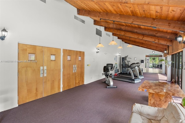 exercise area with carpet, vaulted ceiling, and wood ceiling