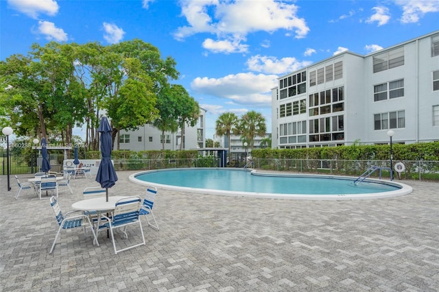 view of pool with a patio area