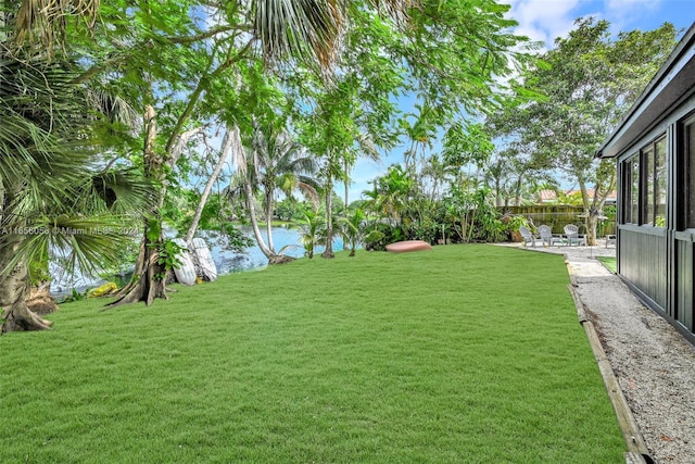 view of yard with a water view