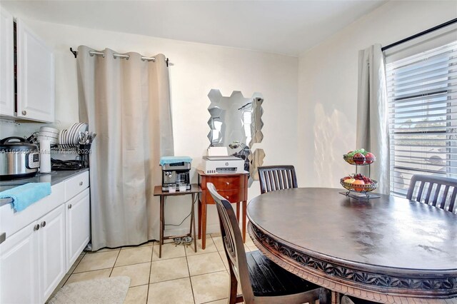 380 E 45th St, Hialeah, FL 33013 - dining space featuring light tile patterned flooring