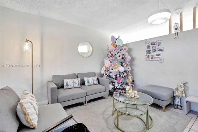 380 E 45th St, Hialeah, FL 33013 - living room featuring a textured ceiling