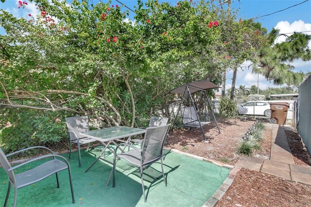 380 E 45th St, Hialeah, FL 33013 - view of patio / terrace featuring outdoor dining area