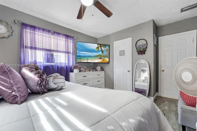 bedroom with ceiling fan and hardwood / wood-style floors