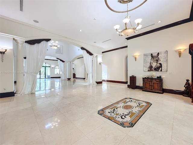 interior space with a chandelier, decorative columns, and crown molding