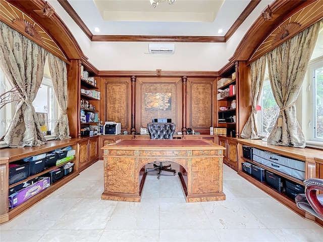 office featuring a tray ceiling, a wall unit AC, a wealth of natural light, and crown molding