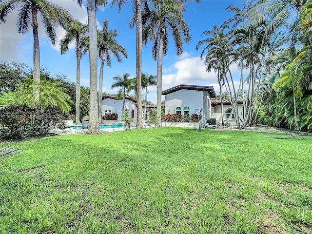6710 SW 92nd St, Pinecrest, FL 33156 - view of grassy yard featuring an outdoor pool
