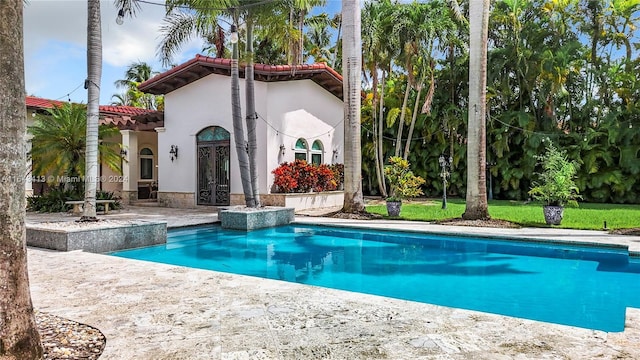 6710 SW 92nd St, Pinecrest, FL 33156 - swimming pool featuring french doors and a patio